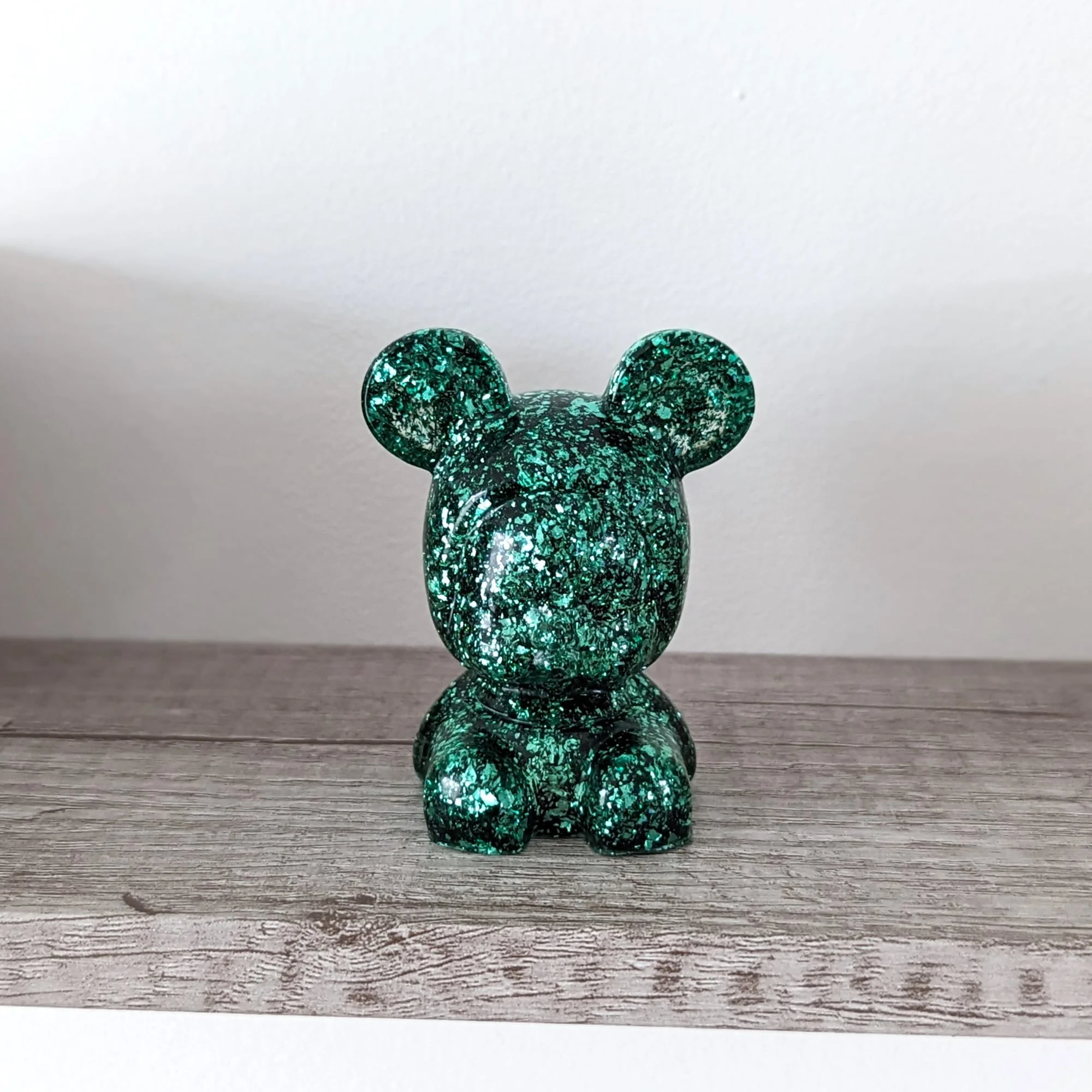 Bébé vert pailleté face